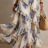 Clara - blaues Boho-Chiffon-Maxikleid mit Blumenmuster, Neckholder, Stufen und Rüschen