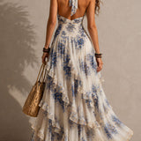Clara - blaues Boho-Chiffon-Maxikleid mit Blumenmuster, Neckholder, Stufen und Rüschen