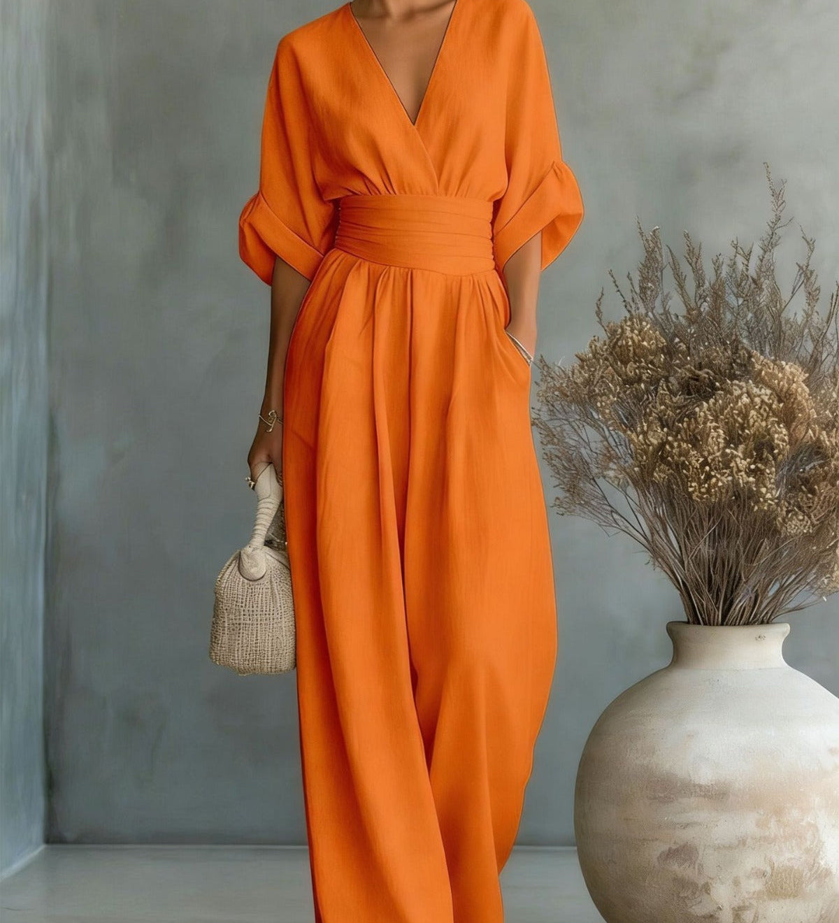 Georgina - eleganter Jumpsuit mit tiefem V-Ausschnitt und weitem Bein