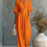 Georgina - eleganter Jumpsuit mit tiefem V-Ausschnitt und weitem Bein